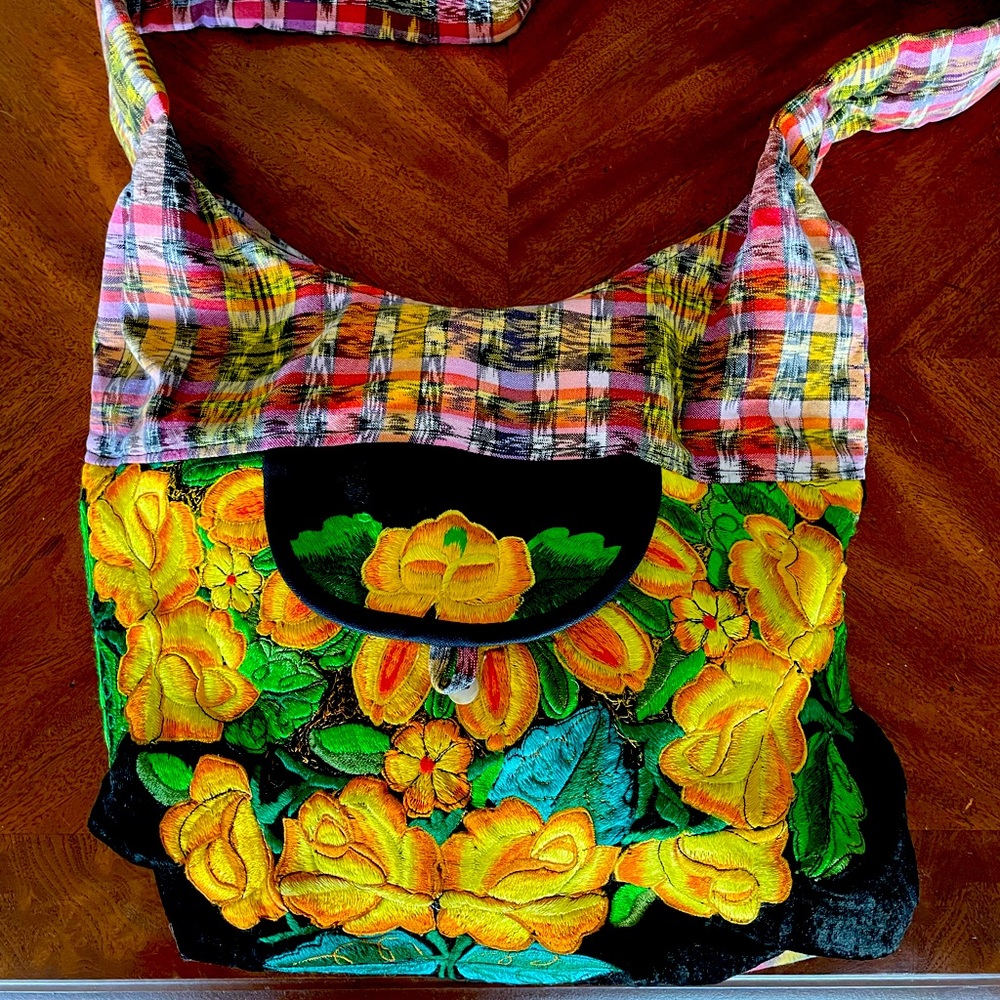 Across body purse is colorful and light.